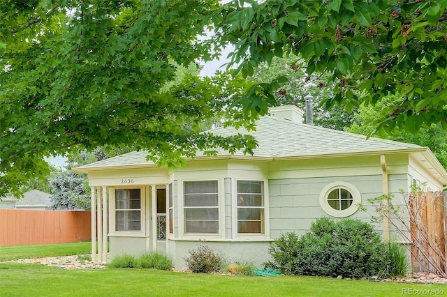 view of home's exterior featuring a yard