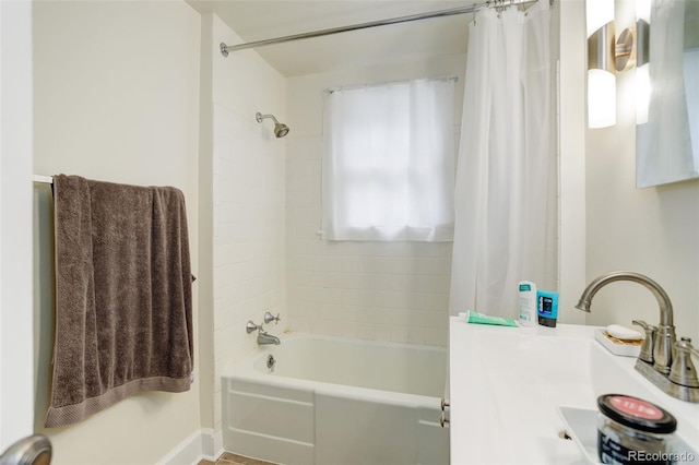 bathroom with shower / bath combination with curtain and vanity