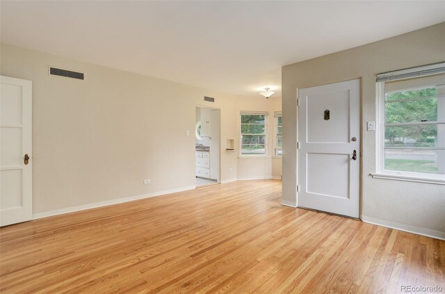 interior space with light hardwood / wood-style floors