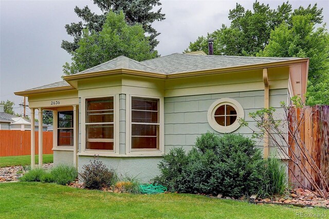 view of property exterior featuring a yard