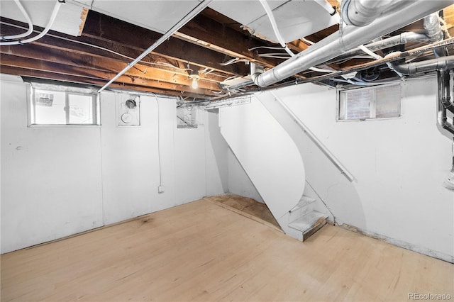 basement with wood-type flooring