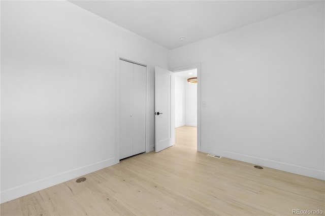 2207 E 25th, Denver, CO 80205 - unfurnished room with light wood-type flooring and baseboards