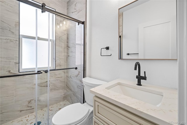 2207 E 25th, Denver, CO 80205 - full bath with a stall shower, toilet, and vanity