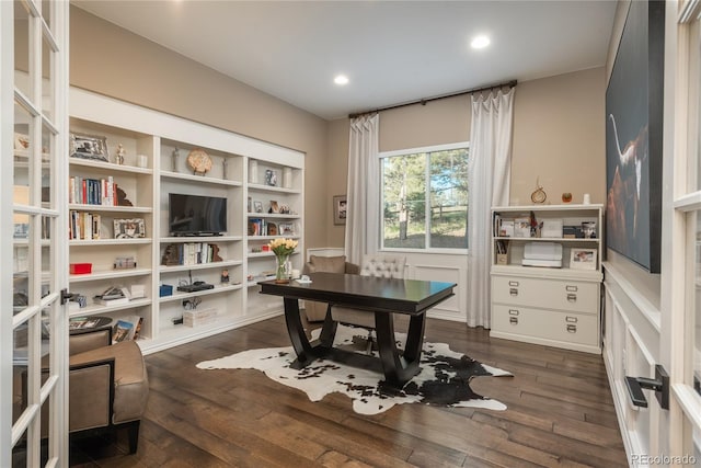 office space with dark wood-type flooring