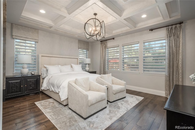 bedroom featuring coffered ceiling, dark hardwood / wood-style floors, a chandelier, and beamed ceiling