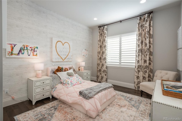 bedroom with hardwood / wood-style floors