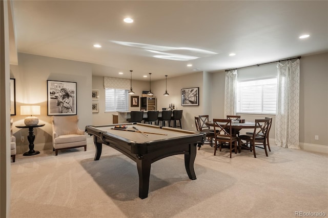 recreation room with light colored carpet and pool table