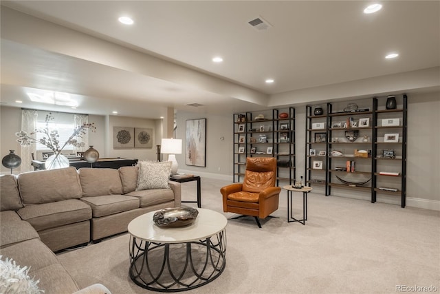 living room featuring light carpet