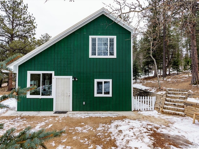 view of snow covered property