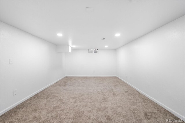 1148 N Clinton St, Aurora, CO 80010 - finished basement featuring recessed lighting, baseboards, and carpet floors