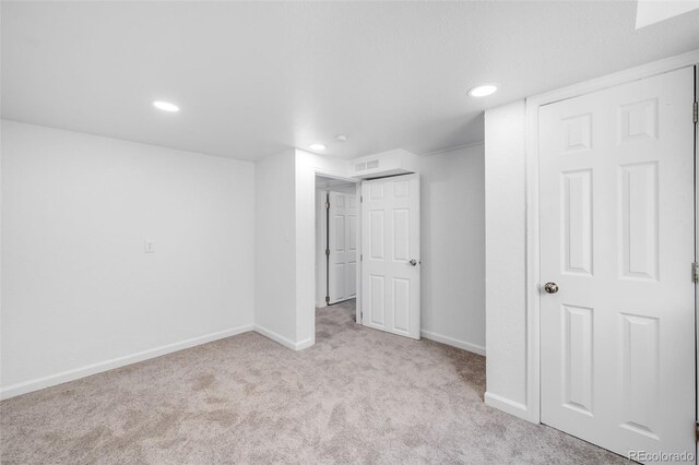 1148 N Clinton St, Aurora, CO 80010 - unfurnished bedroom featuring carpet flooring, baseboards, and recessed lighting