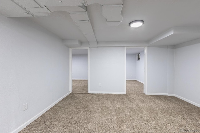 1345 Laredo St, Aurora, CO 80011 - finished below grade area featuring baseboards and carpet floors