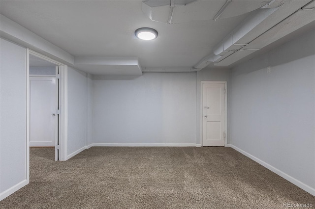 1345 Laredo St, Aurora, CO 80011 - finished below grade area featuring carpet floors and baseboards