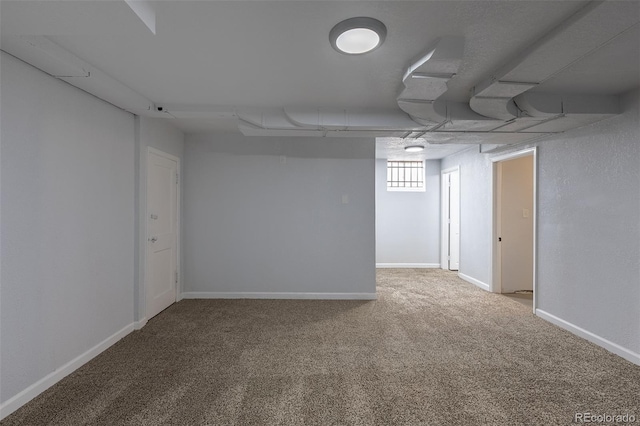 1345 Laredo St, Aurora, CO 80011 - below grade area with baseboards and carpet floors