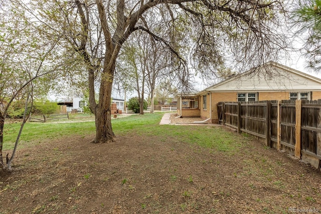 1345 Laredo St, Aurora, CO 80011 - view of yard with fence