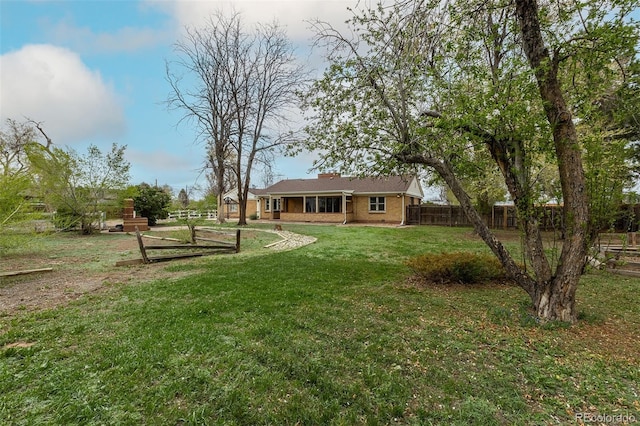 1345 Laredo St, Aurora, CO 80011 - view of yard featuring fence
