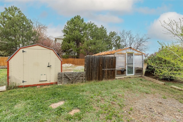 1345 Laredo St, Aurora, CO 80011 - view of shed with a fenced backyard