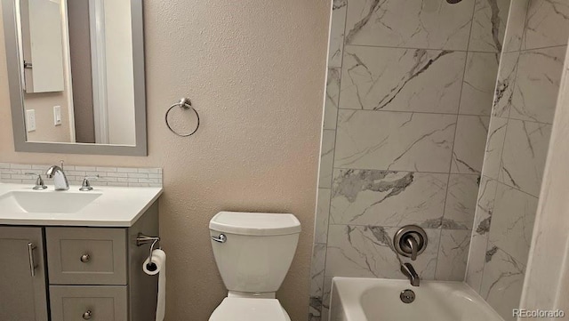 full bathroom with toilet, washtub / shower combination, and vanity