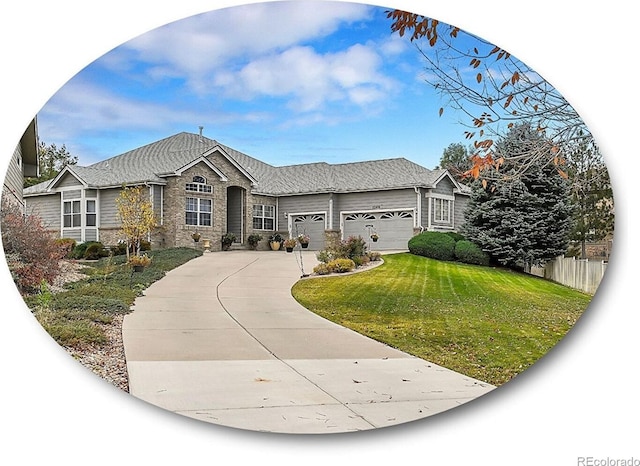 view of front facade featuring a garage and a front yard