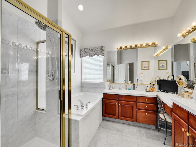 bathroom featuring vanity, tile patterned floors, and independent shower and bath