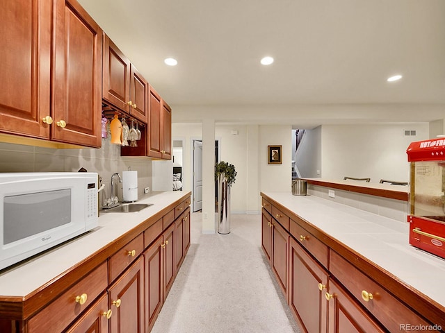 kitchen with tasteful backsplash and sink