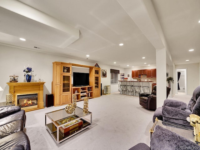 living room featuring light carpet