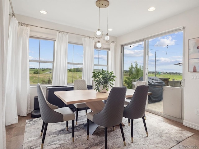 3056 Yale Dr, Broomfield, CO 80023 - dining area featuring plenty of natural light, recessed lighting, and light wood-style floors