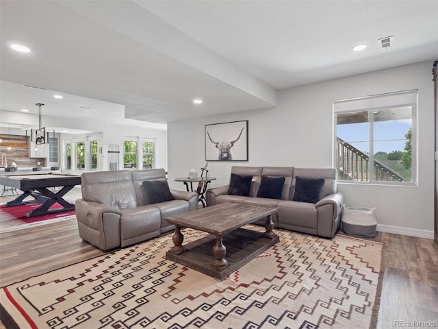3056 Yale Dr, Broomfield, CO 80023 - living area with wood finished floors and recessed lighting