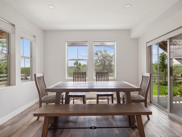 3056 Yale Dr, Broomfield, CO 80023 - dining space with light wood finished floors and recessed lighting
