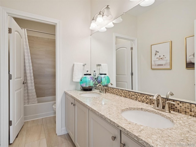 3056 Yale Dr, Broomfield, CO 80023 - bathroom with double vanity and shower / tub combo with curtain