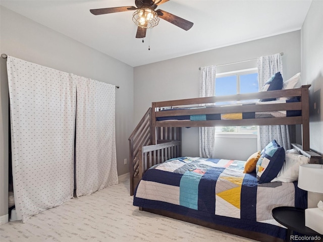 3056 Yale Dr, Broomfield, CO 80023 - bedroom with ceiling fan and baseboards