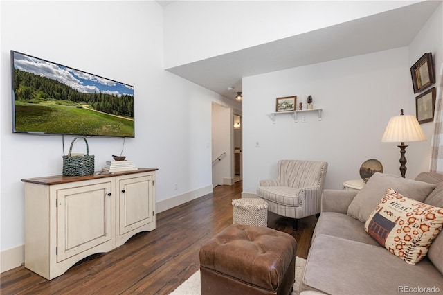 living room featuring dark wood-type flooring