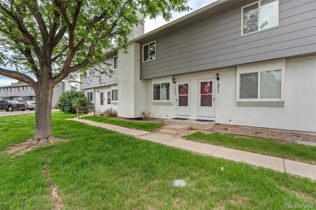 1275 Soaring Eagle Dr, Colorado Springs, CO 80915 - view of front of home with a front lawn and stucco siding