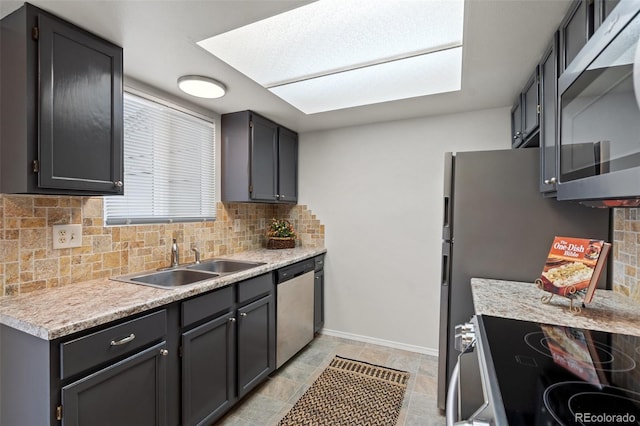 1275 Soaring Eagle Dr, Colorado Springs, CO 80915 - kitchen featuring stainless steel appliances, backsplash, and light countertops