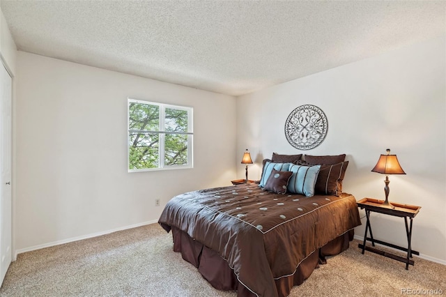 1275 Soaring Eagle Dr, Colorado Springs, CO 80915 - carpeted bedroom with a textured ceiling and baseboards