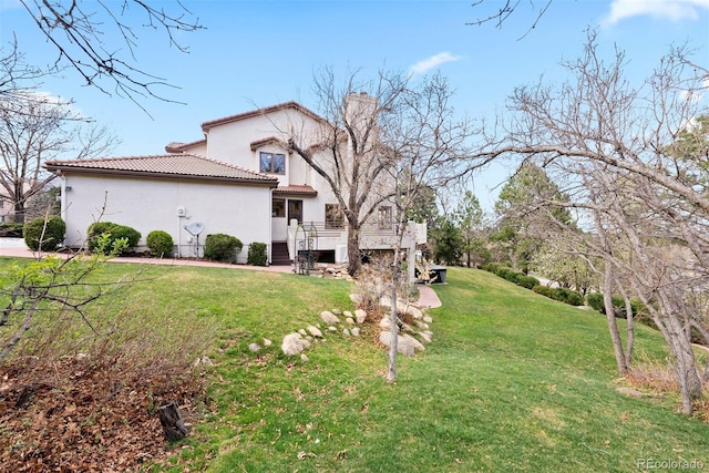 150 Chantrey Ct, Colorado Springs, CO 80906 - view of yard with a wooden deck and stairway