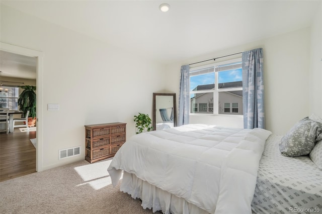 bedroom featuring carpet