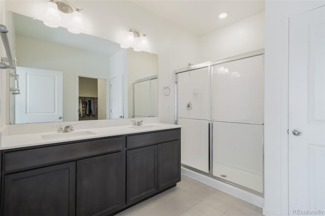 bathroom with vanity and walk in shower