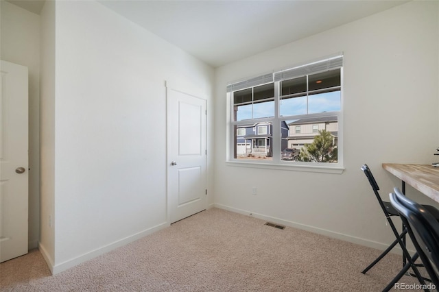 unfurnished office with light carpet