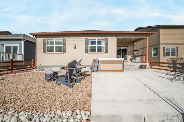 back of house with a patio area