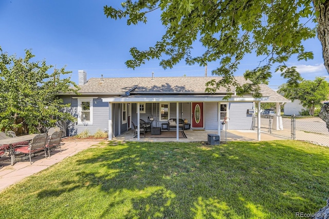 235 W Lehigh Ave, Englewood, CO 80110 - back of house featuring a patio, a chimney, and a shingled roof