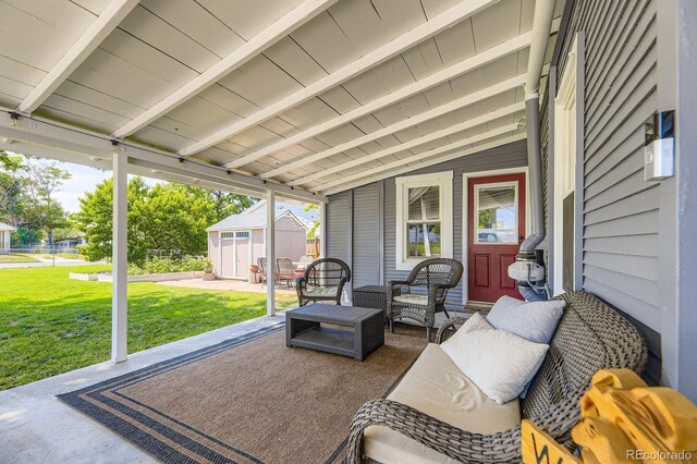 235 W Lehigh Ave, Englewood, CO 80110 - view of patio / terrace featuring a storage shed