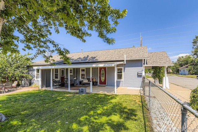 235 W Lehigh Ave, Englewood, CO 80110 - rear view of house with a shingled roof