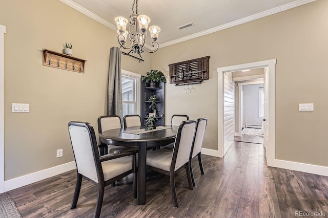 235 W Lehigh Ave, Englewood, CO 80110 - dining area with a chandelier, ornamental molding, dark wood finished floors, and a baseboard heating unit