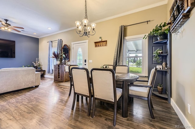 235 W Lehigh Ave, Englewood, CO 80110 - dining area with healthy amount of natural light, a chandelier, ornamental molding, dark wood-type flooring, and ceiling fan