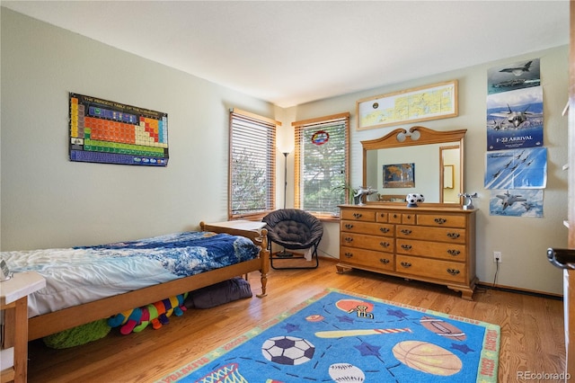 50 Deerwood Dr, Littleton, CO 80127 - bedroom featuring wood finished floors