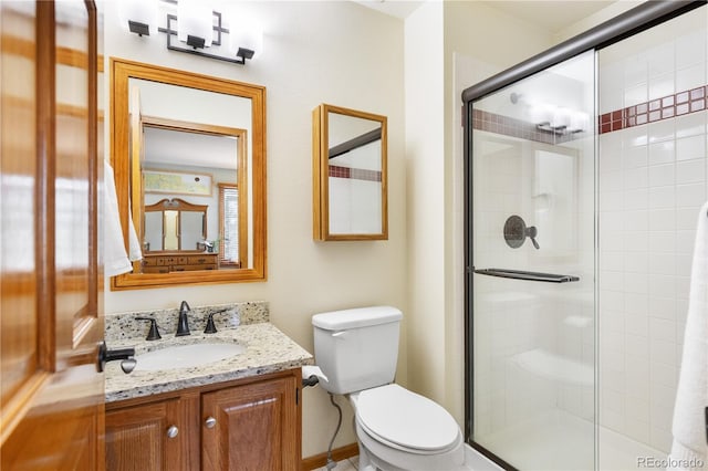 50 Deerwood Dr, Littleton, CO 80127 - full bathroom with toilet, a shower stall, and vanity