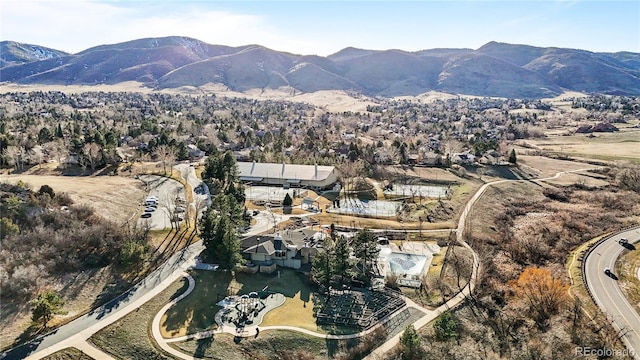 50 Deerwood Dr, Littleton, CO 80127 - aerial overview of property's location with mountains