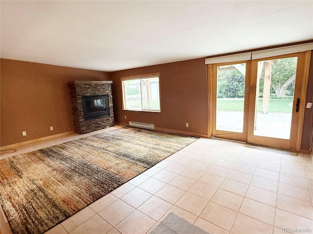 8930 W 55th Ave, Arvada, CO 80002 - unfurnished living room with a baseboard radiator, a stone fireplace, and light tile patterned floors