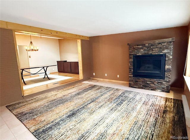 8930 W 55th Ave, Arvada, CO 80002 - unfurnished living room with a fireplace and a chandelier